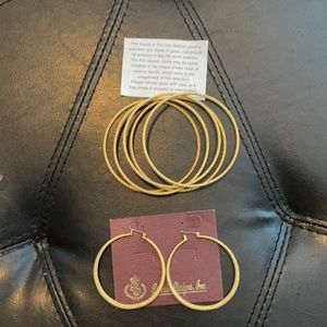 Gold matching bracelet snd earrings